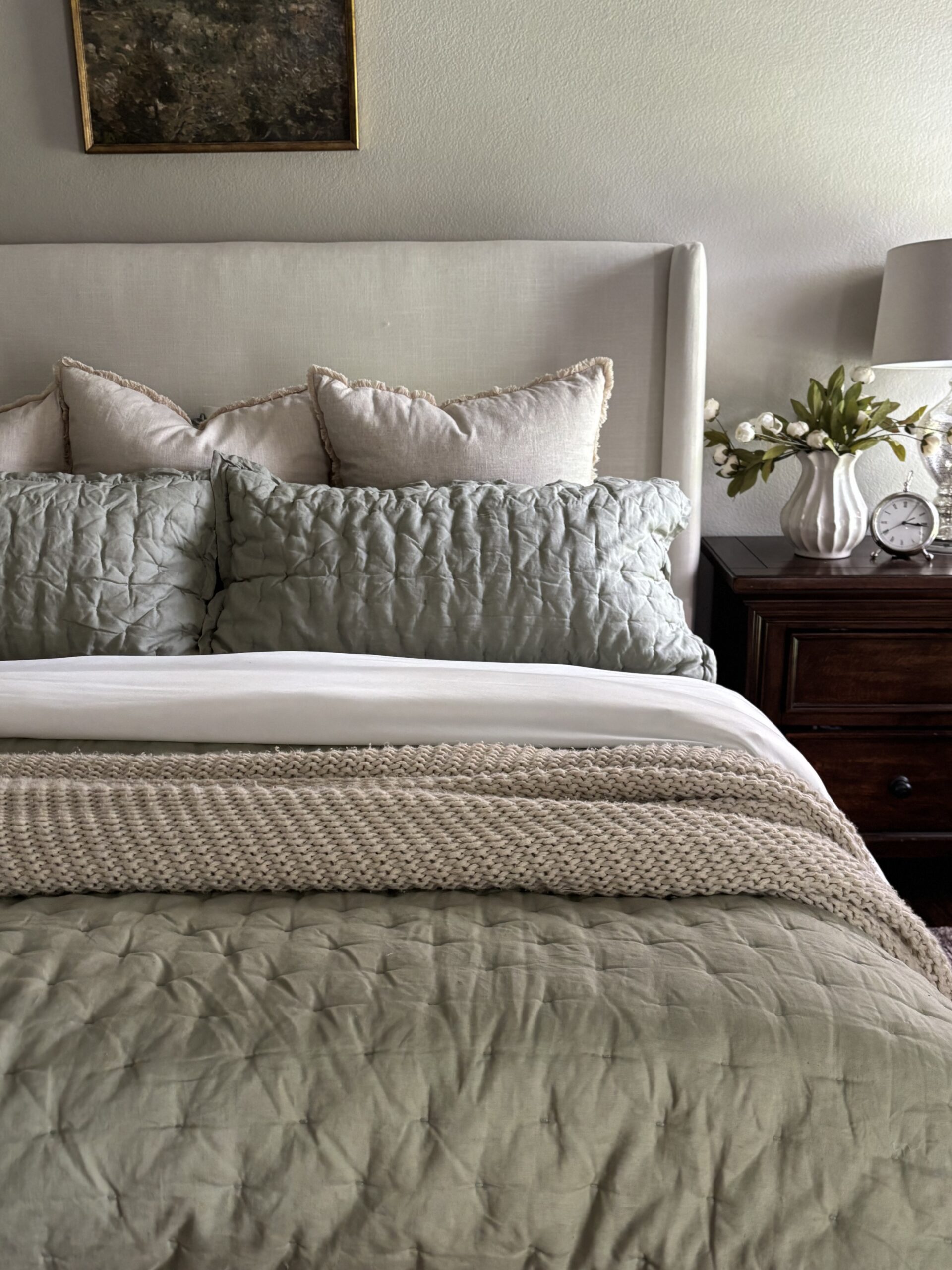 Summer bedroom refresh featuring Quince bamboo sheets, linen quilt, sage green bedding, and layered textures